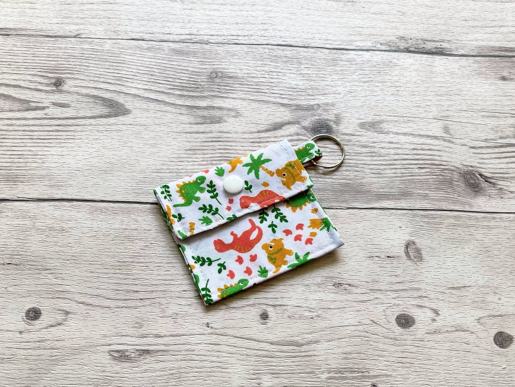 Dinosaurs round tin lip balm white fabric keyring, keychain. Lipstick holder.