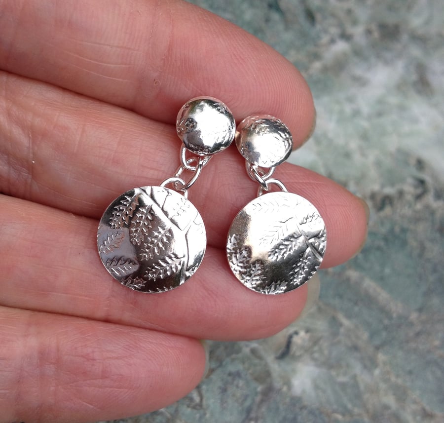 Leafy silver disc earring