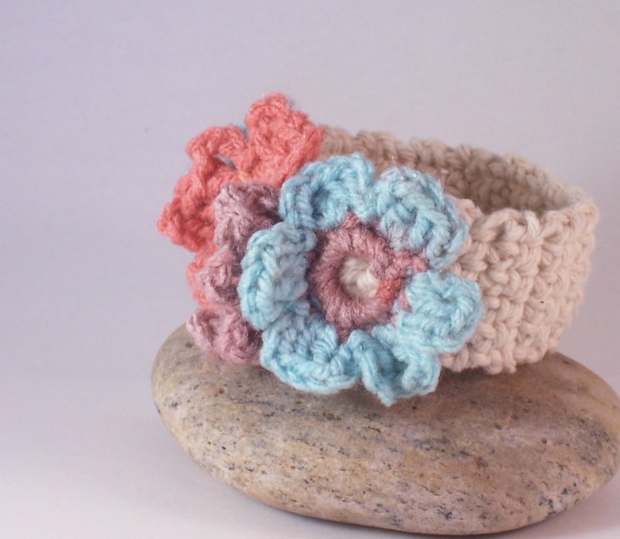 Crochet cuff with three floral blooms in aqua Folksy