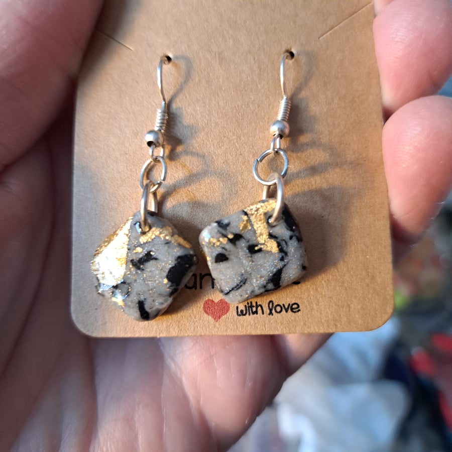 A pair of marble effect polymer clay earrings, grey, black, white and gold