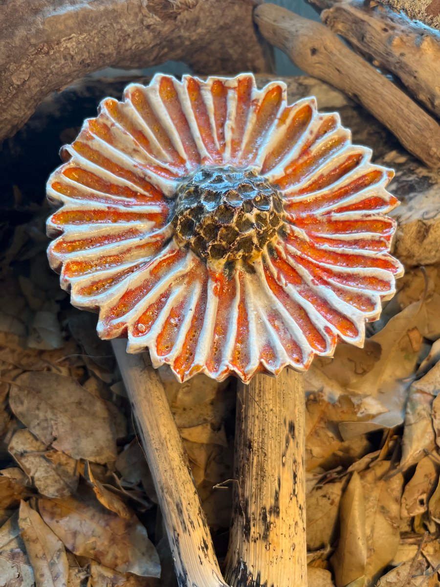 Ceramic sunflower fired with red glaze 