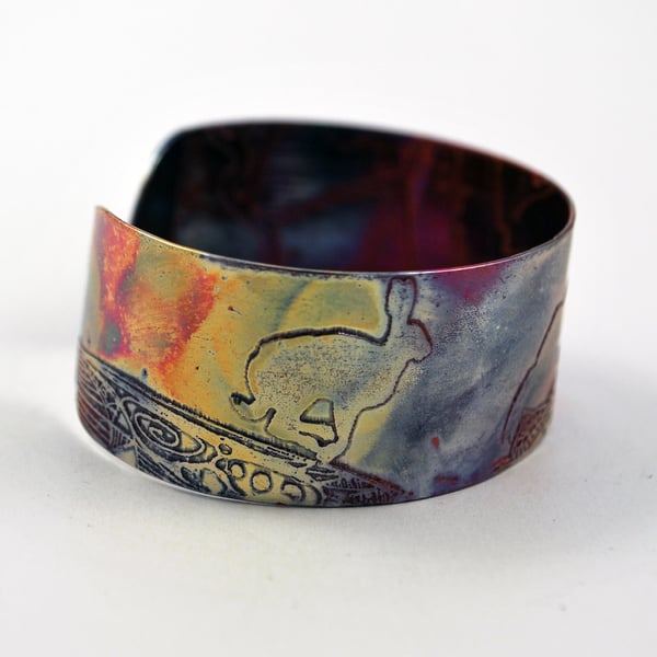 Medium copper Hare cuff, leaping, running, jumping hare