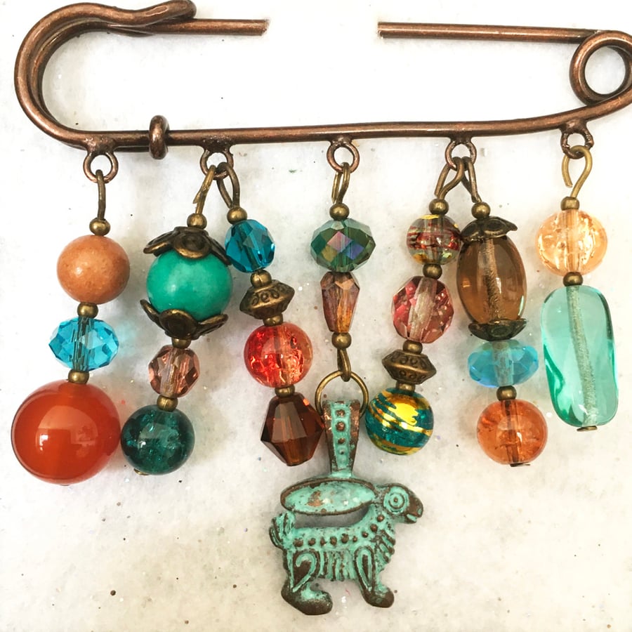 Embellished kilt pin with Mykonos verdigris hare.