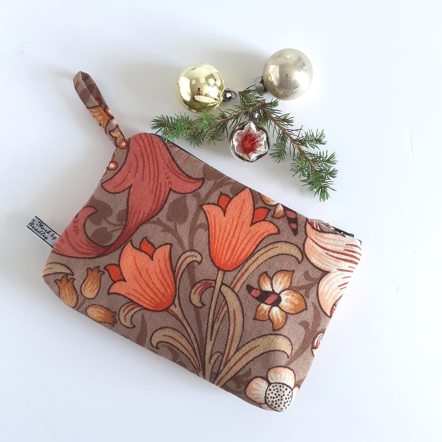 Make up or toiletries bag in a vintage Morris and Co autumnal Golden Lily print.