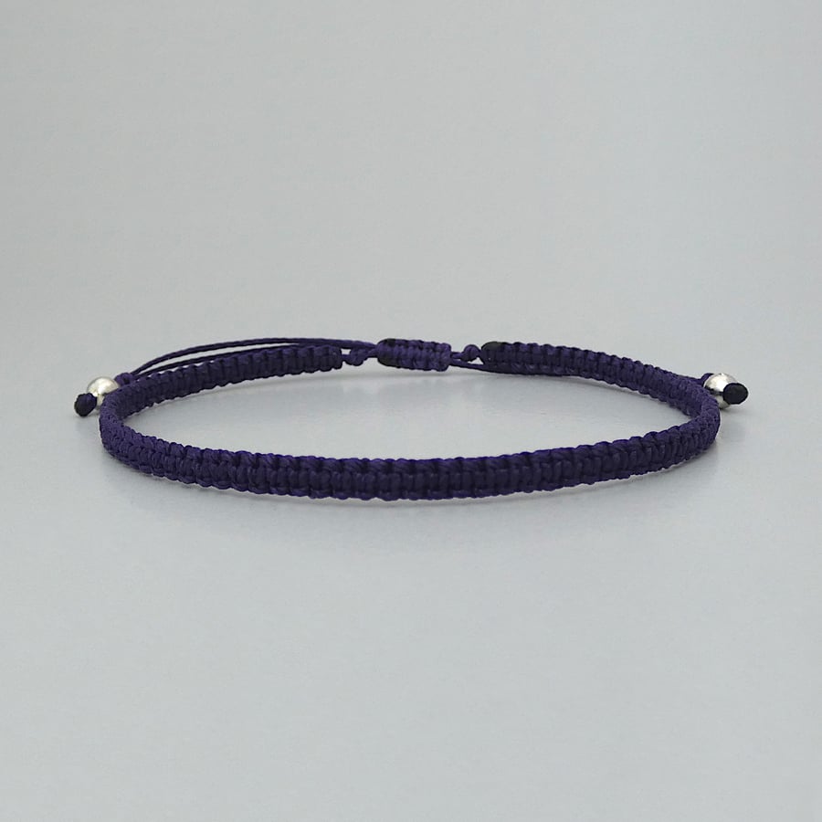 Dark Purple macramé bracelet & silver plated bead ends. Extends from 7” to 9.5"