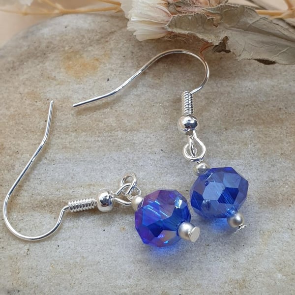silver plated earrings with 8mm crystal  royal blue faceted rondelle beads 