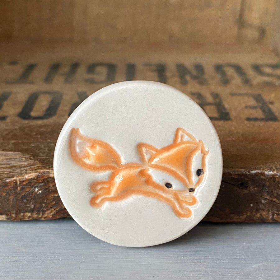 Ceramic fox magnet orange