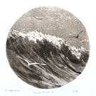 Sea, surf and gliding gulls black and white monoprint coastal beach scene