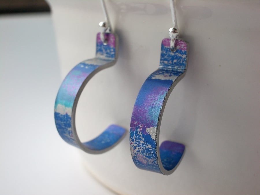 Hoop earrings in purple and blue