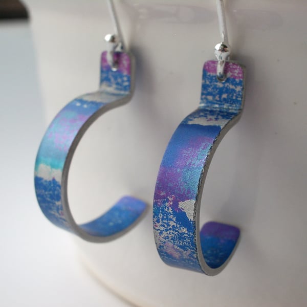 Hoop earrings in purple and blue