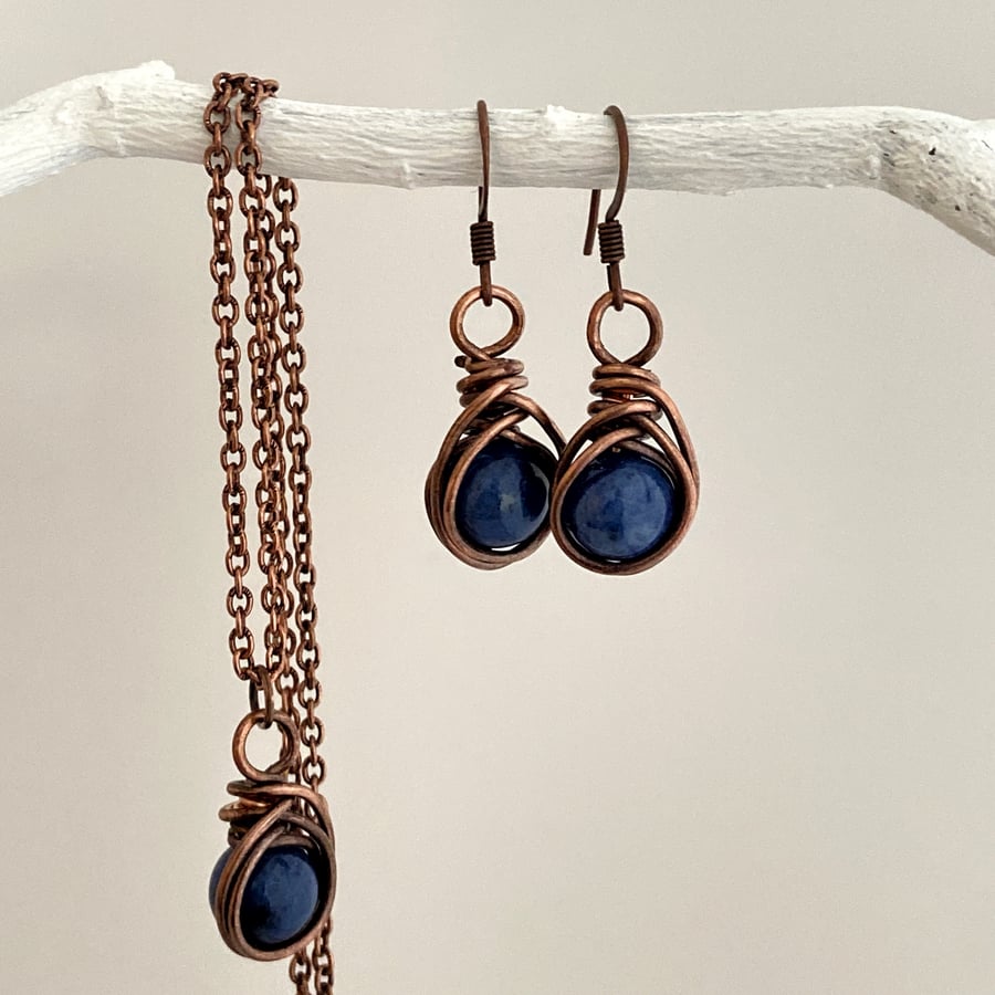 Copper wire wrapped Dumortierite gemstone necklace & earring sets.