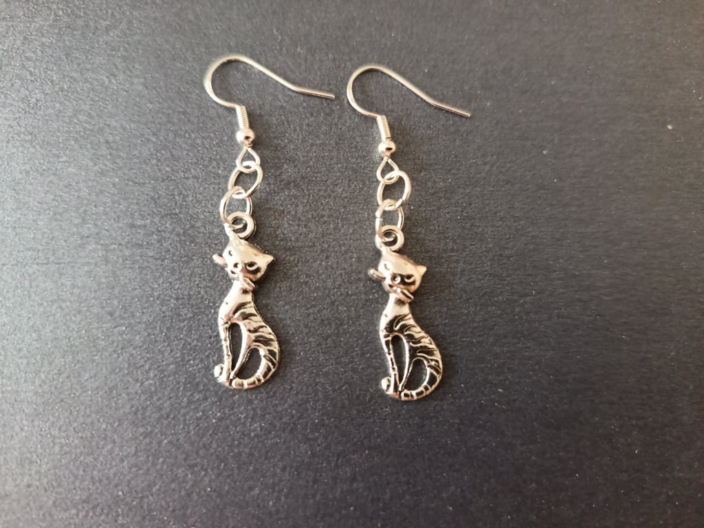Silver cat charm dangle earrings