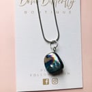 Abalone shell pendant on necklace