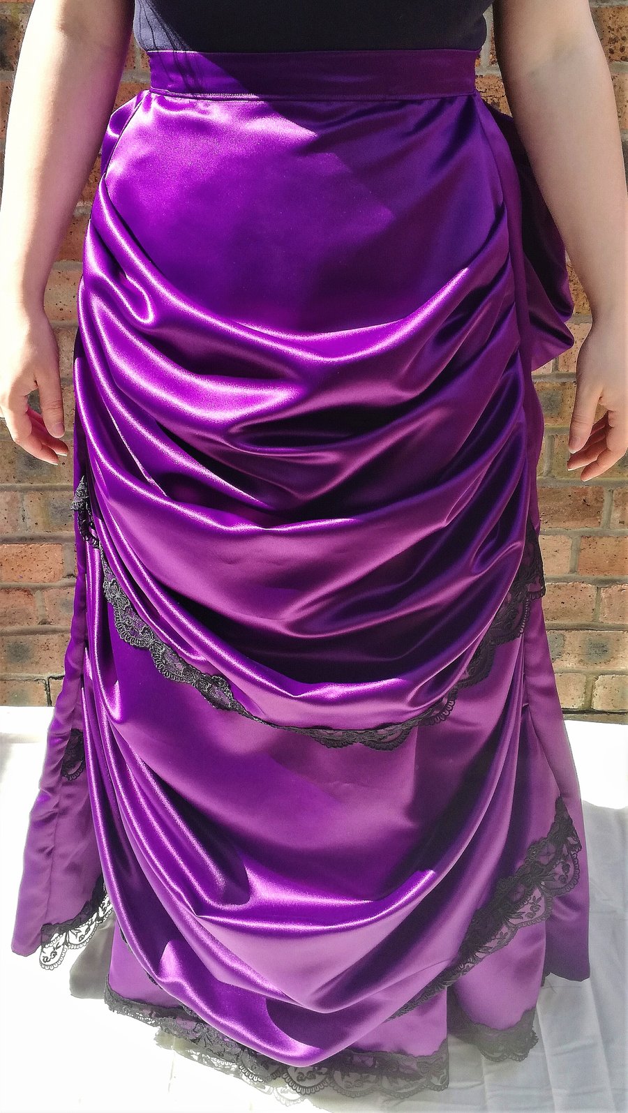 Hand made Victorian bustle skirt in purple duchess satin with bustle cage