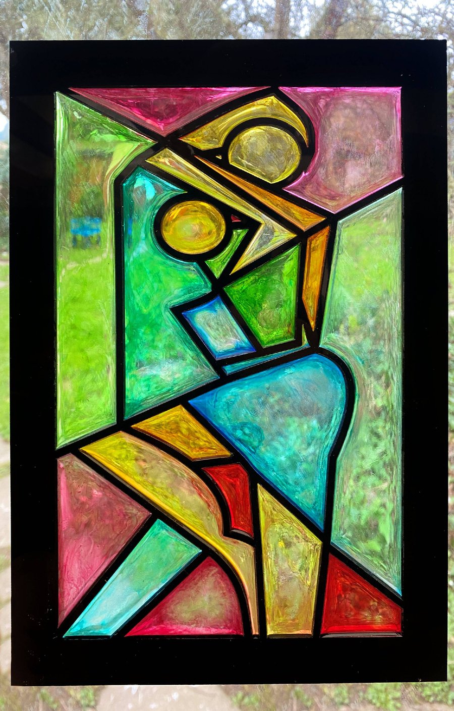 This is a unique art work, made from acrylic and resins.  The dancers embrace