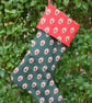 Santa's Christmas Stocking In Festive Fabric - Image 1