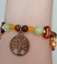 Elasticated beaded red squirrel, tree of life and gold acorn charm bracelet  - Image 5
