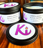 Sandalwood & Black Pepper scented soy candle in a black tin