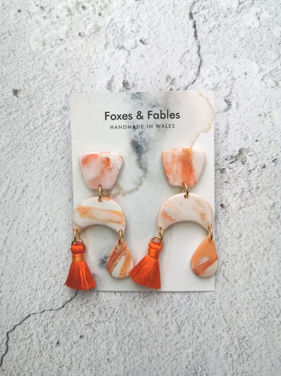 Peach Melba Collection Chandelier Earrings with Bright Orange Tassles