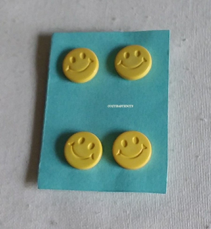Yellow smiley face buttons