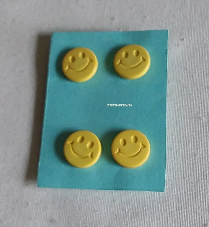Yellow smiley face buttons
