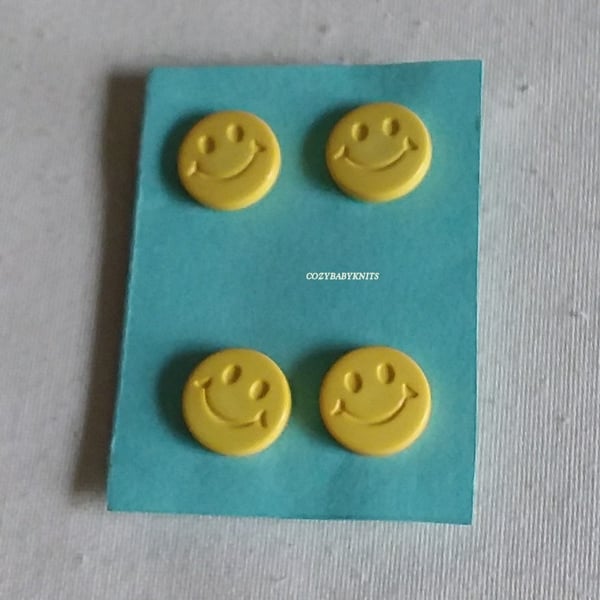 Yellow smiley face buttons