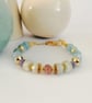 Aquamarine beaded bracelet, white beryl, strawberry quartz & Tanzanite - Image 10