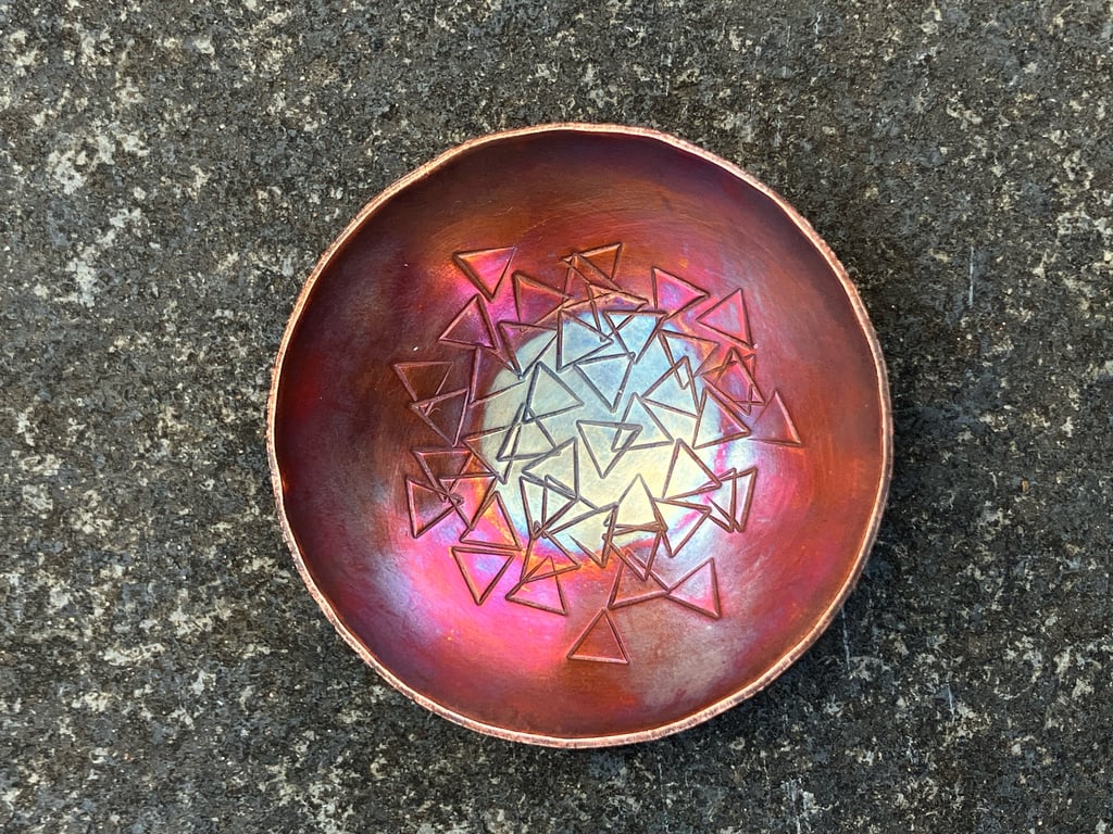 Flame painted copper bowl with triangle stamped pattern