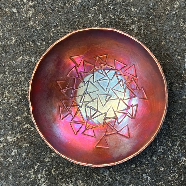 Flame painted copper bowl with triangle stamped pattern