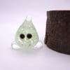 small glass wisp figure