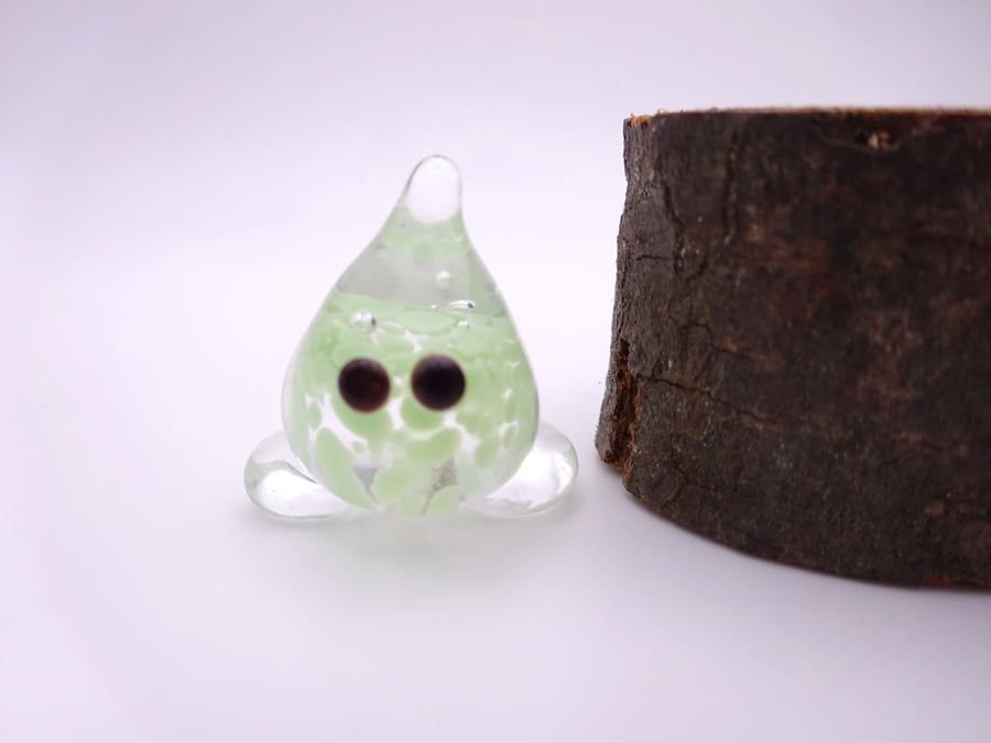 small glass wisp figure