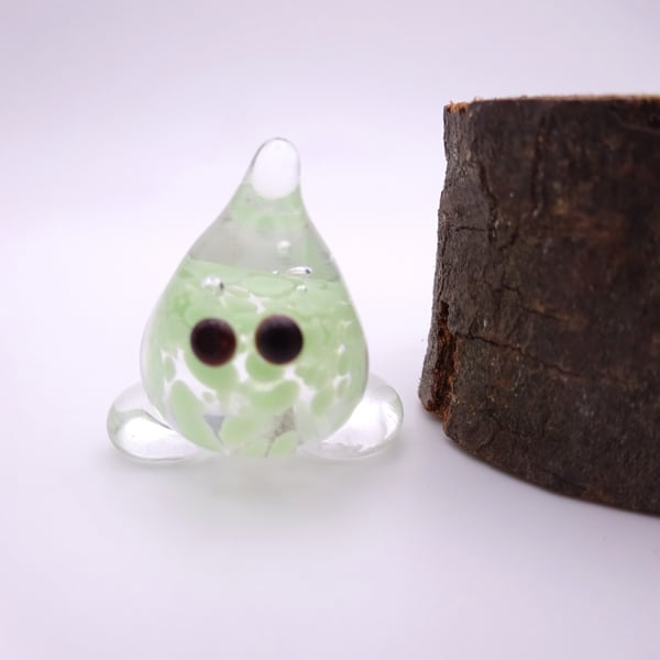 small glass wisp figure