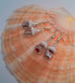 White Flower Bead, Silver Bead Cap and Glass Bead with a Silver Centre, Earrings - Image 1