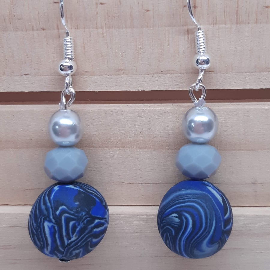 Blue and silver dangly earrings