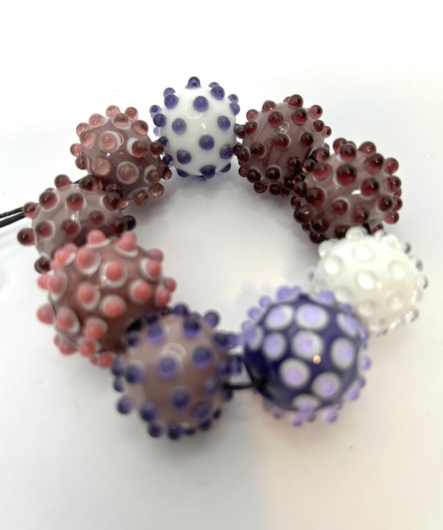 Handmade brown patterned lamp work glass beads