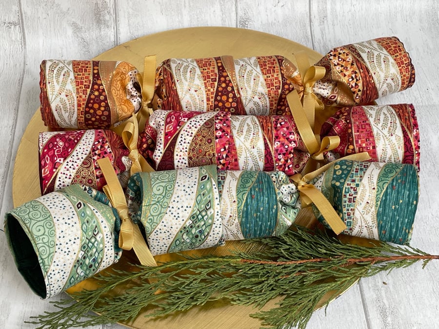 Set of three Christmas crackers. Waves and swirls with gold accents