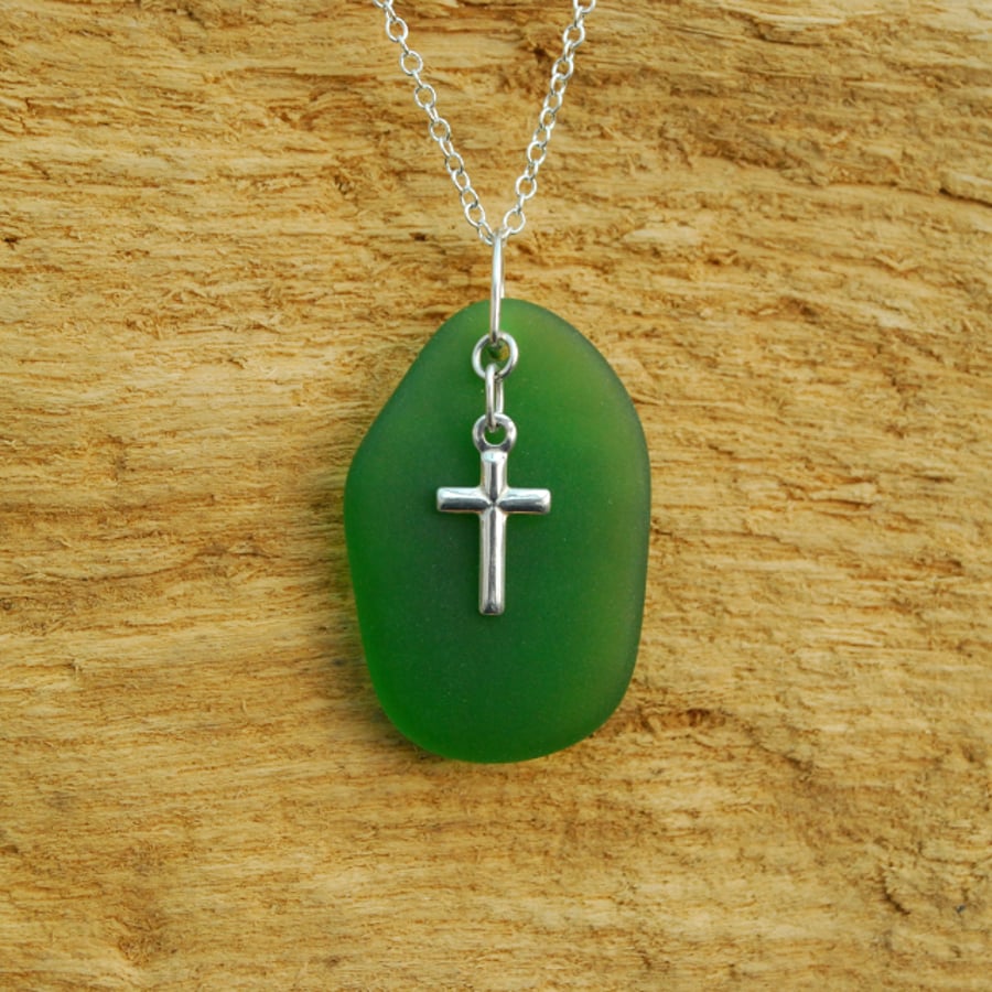 Green beach glass pendant with cross charm