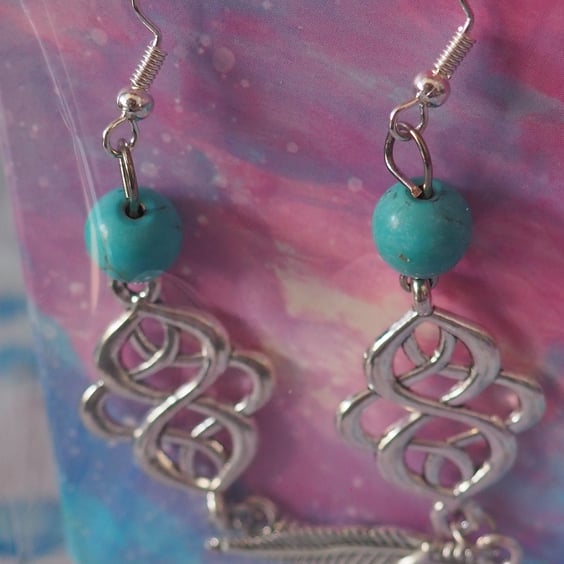 Turquoise Beaded Dangle Earrings with Elongated Celtic Charms and Feathers