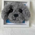Needle felted puppy heads in frame