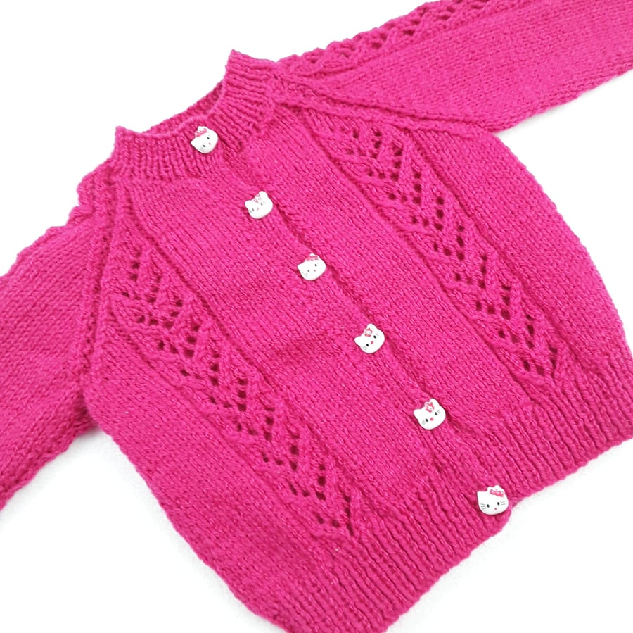 Cerise pink baby girl cardigan hand knitted with lace panels 6 - 12 months