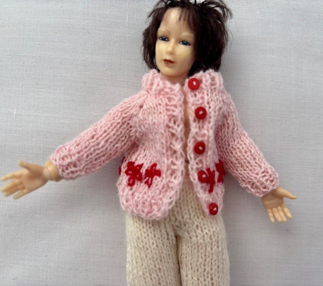 Tiny knitted cardigan with embroidery in miniature 12th scale for dolls house