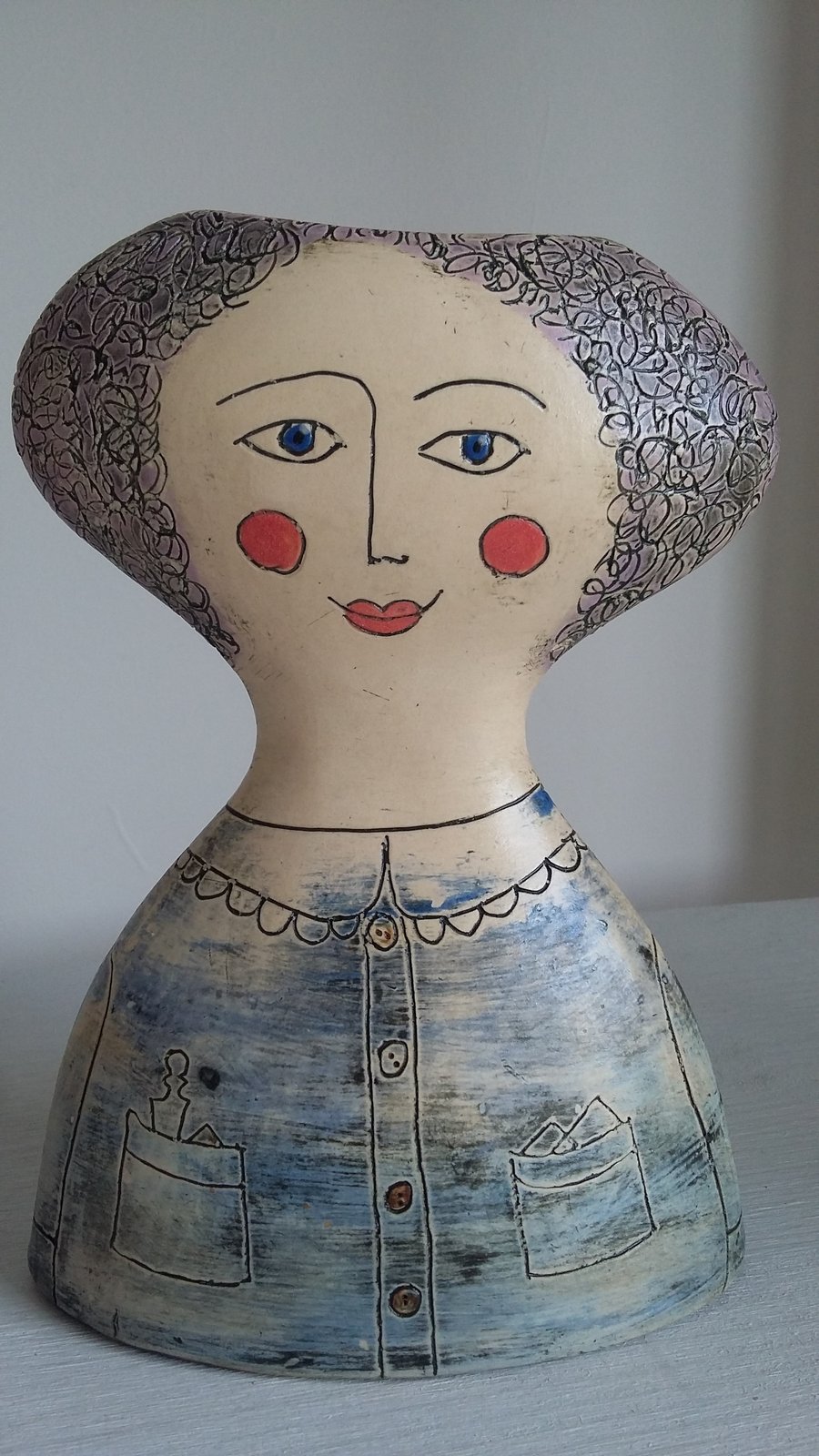 Figurative ceramic vase 