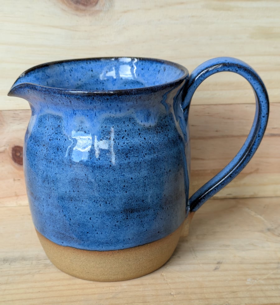 Large wavy blue speckled jugs
