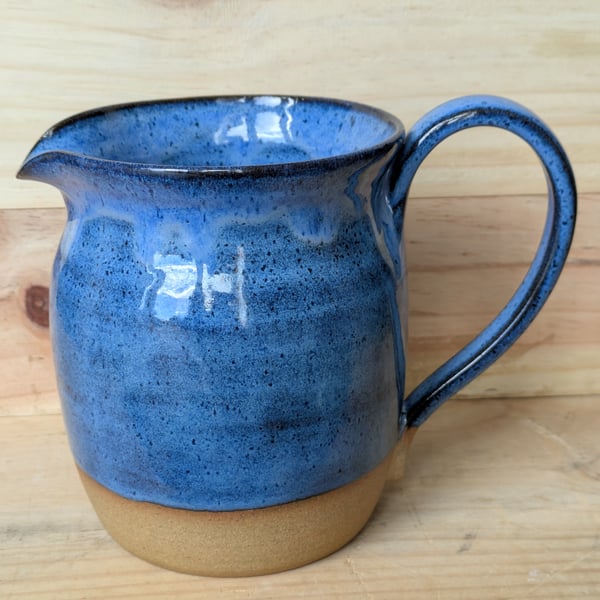 Large wavy blue speckled jugs
