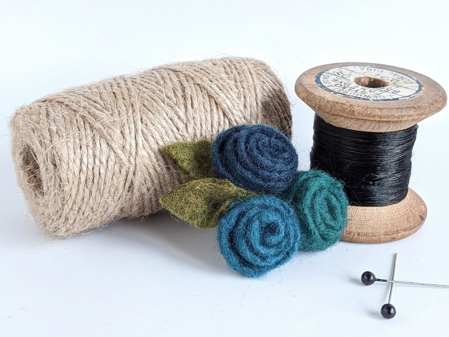 Small felted roses brooch in shades of teal