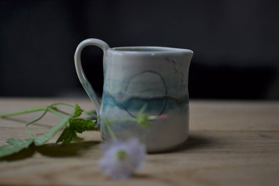 Small ceramic seascape milk jug - glazed in turquoise, greens and blues