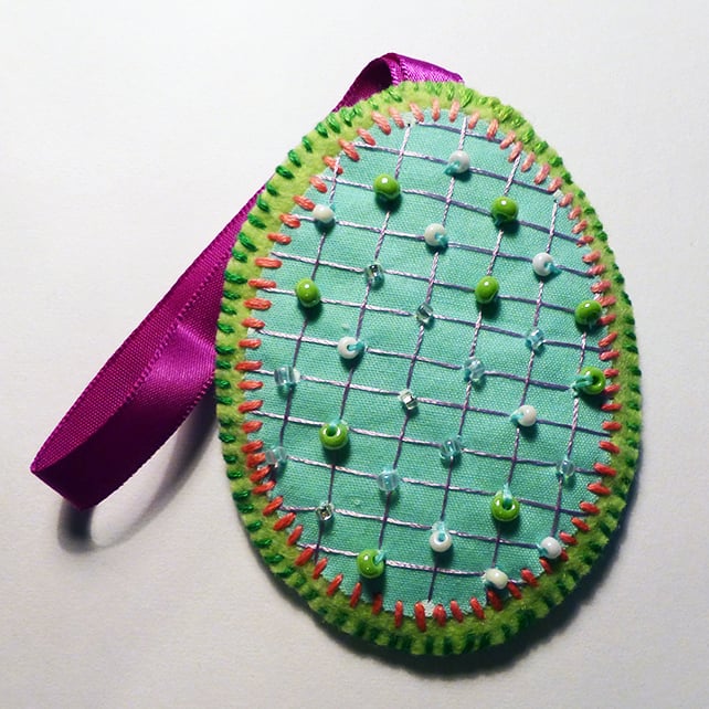 Decoration - Hanging oval - purple ribbon.