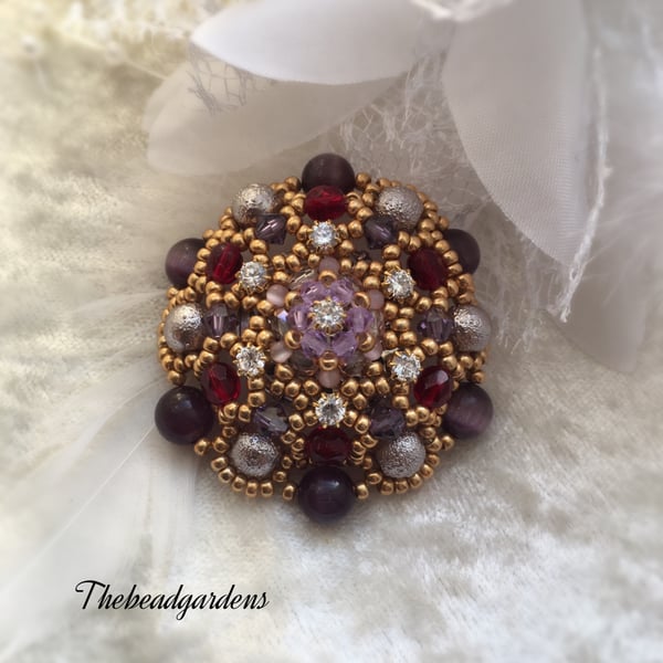 Purple round brooch 