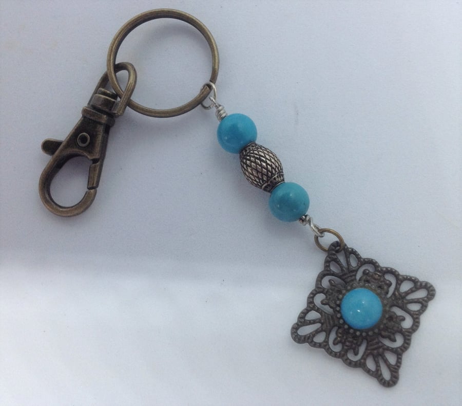 Keyring with a vintage pendant and real turquoise beads