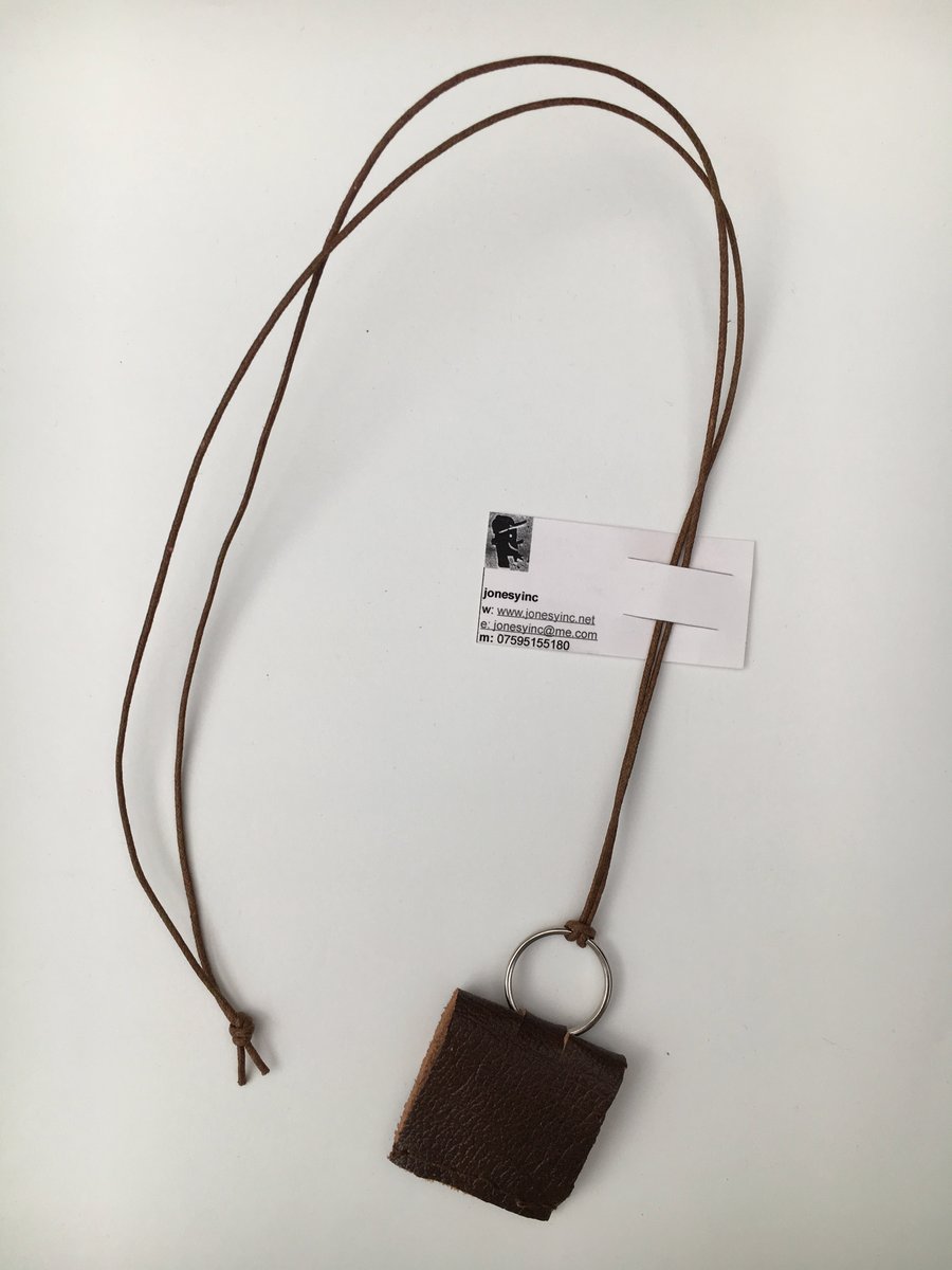 Handsewn leather pendant